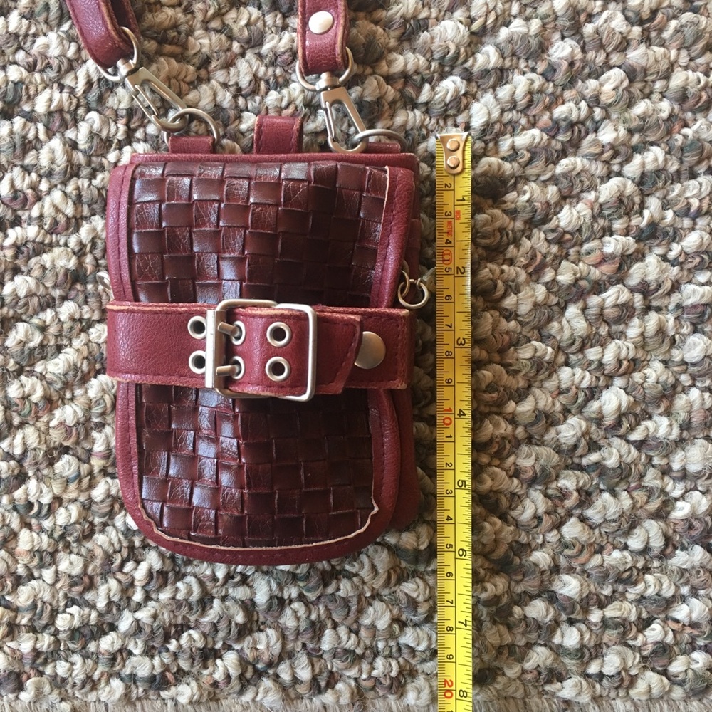 Red compact sized convertible purse